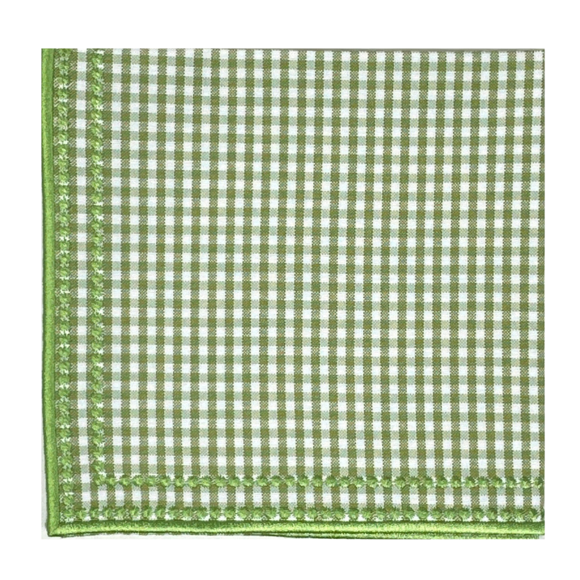 Green and white checkered napkin on a white background