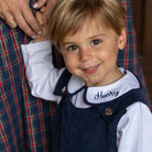 Boys’ Louis Longall in Midnight Blue Corduroy with Tinsel Tartan tabs, HD gold buttons, and full tartan lining designed to show when the cuffs are rolled.
