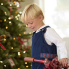 Boys’ Louis Longall in Midnight Blue Corduroy with Tinsel Tartan tabs, HD gold buttons, and full tartan lining designed to show when the cuffs are rolled.