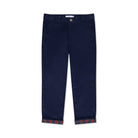 Boys’ Bradford Trousers in Midnight Blue Corduroy, fully lined in Tinsel Tartan with cuffed hems revealing festive navy, red, and green plaid.