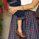 Boys’ Louis Longall in Midnight Blue Corduroy with Tinsel Tartan tabs, HD gold buttons, and full tartan lining designed to show when the cuffs are rolled.
