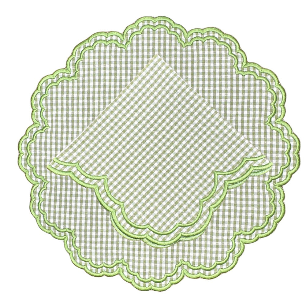 Green checkered doilies with scalloped edges on a white background