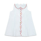 Henry Duvall Lucy Dress in blue micro dot cotton featuring a Peter Pan collar, red scalloped trim, and embroidered crayons, classic girls back-to-school dress for first day of school photos and classroom celebrations.
