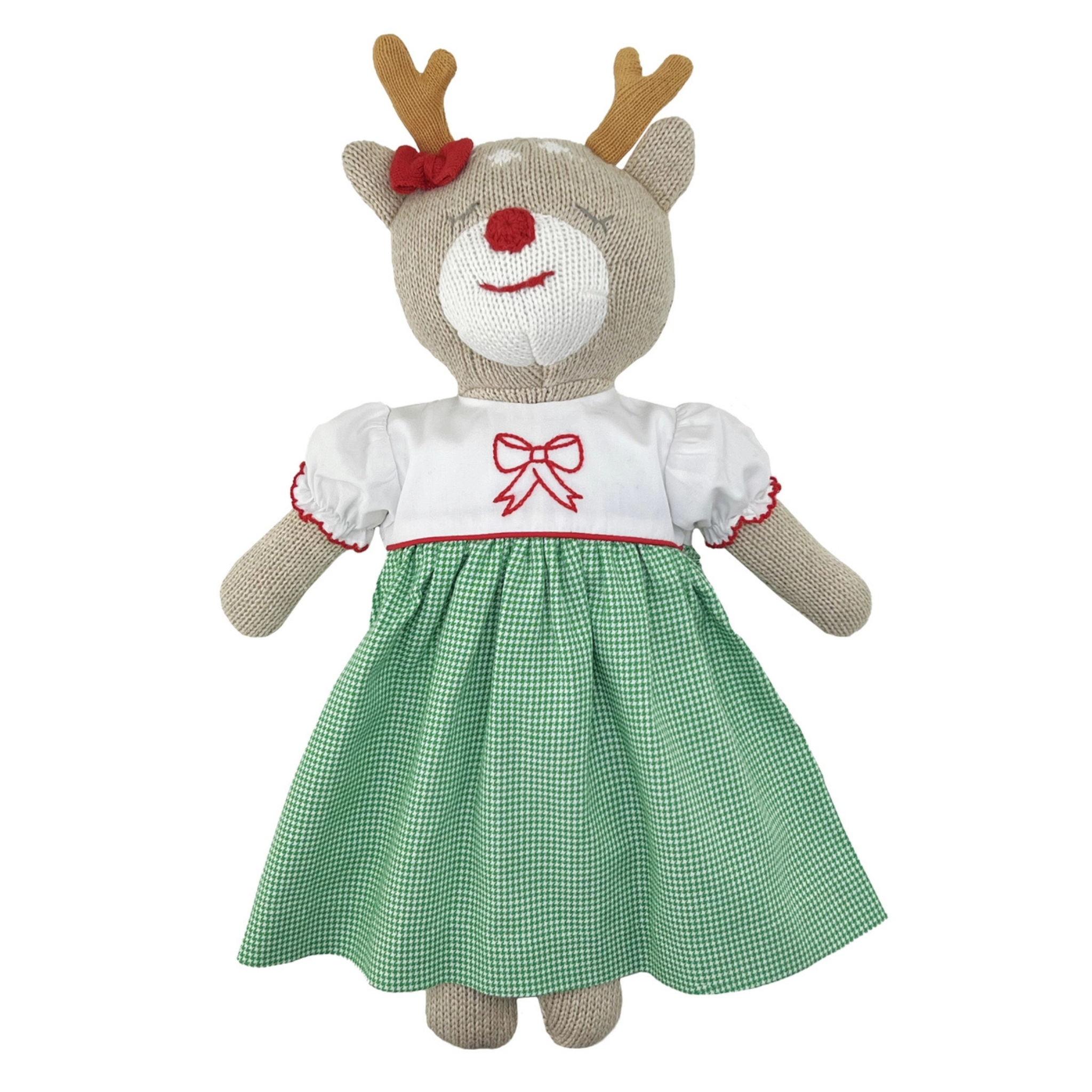 Hand-knit reindeer stuffed animal wearing green gingham dress with red embroidered bow – classic holiday gift for girls
