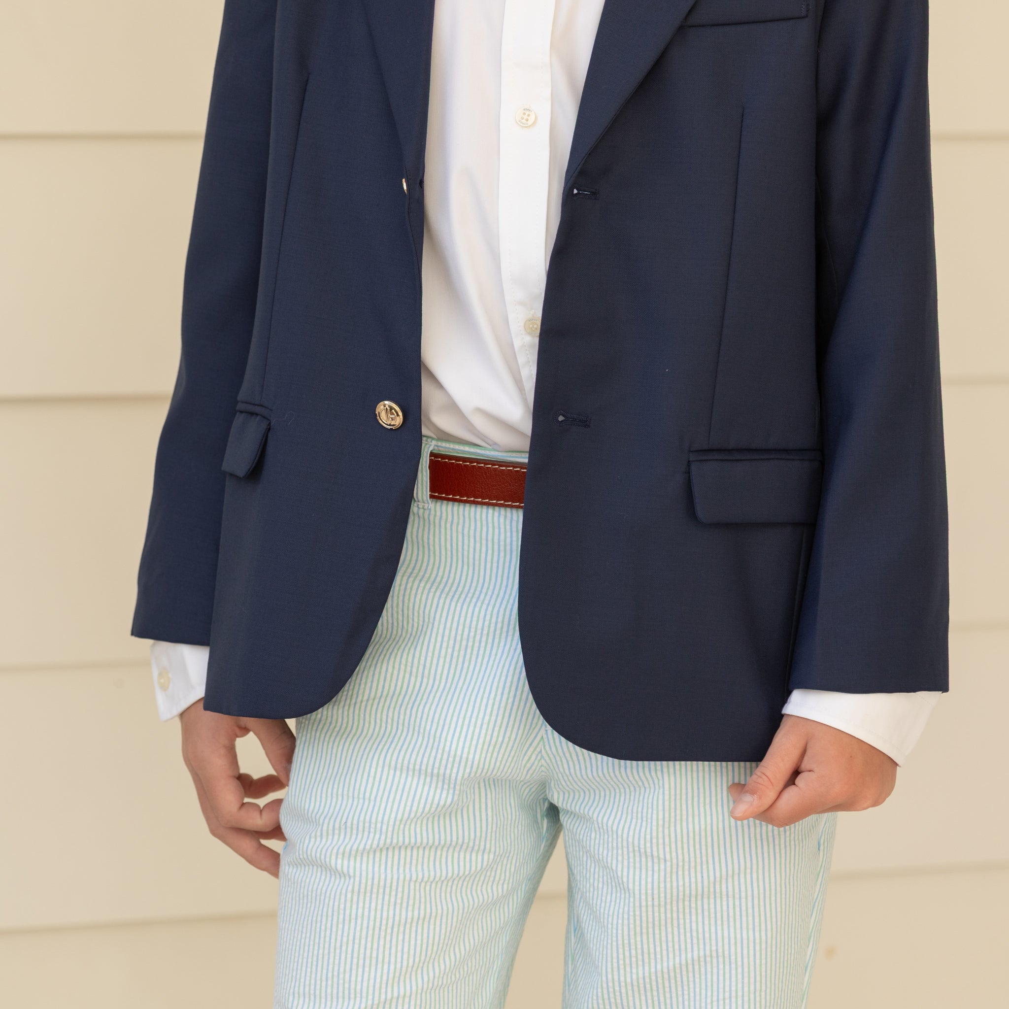 Boy wearing the Henry Duvall Bradford Trousers, a polished boys trouser styled for spring occasions and sibling coordination.