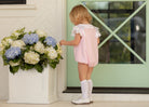 Classic white nylon knee high socks for girls and toddlers, lightweight with ribbed stay-up top, designed for comfort and perfect fit, ideal for pairing with Mary Janes or dress shoes from Henry Duvall’s Fall Collection