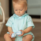 Baby boy wearing the Henry Duvall Banks Bubble, a classic spring outfit designed for family photos and special occasions.