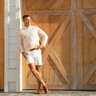 Henry Duvall men’s pale pink crewneck sweater, a classic preppy knit designed for timeless everyday wear.