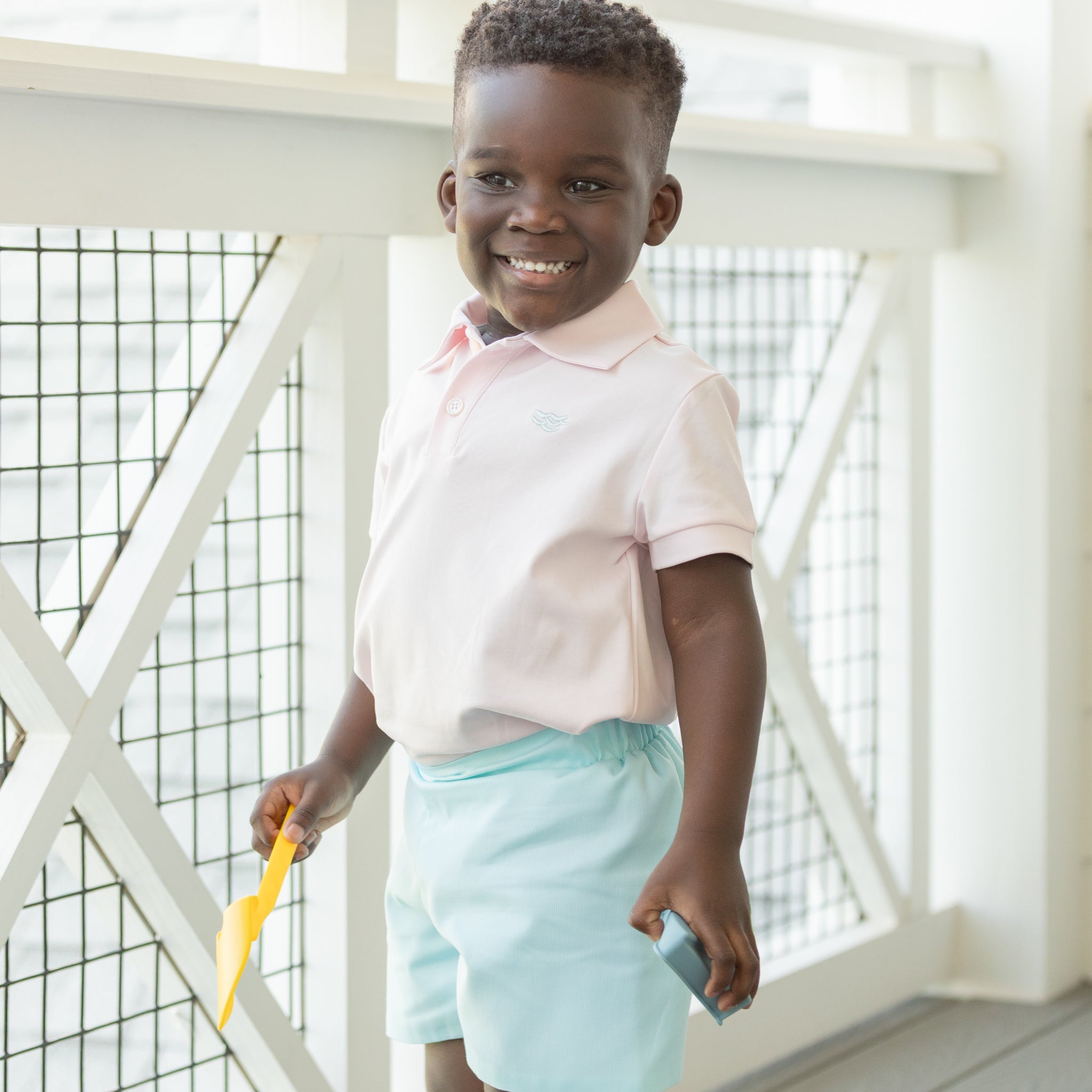 Henry Duvall boys classic polo shirt in Pink Sand, a timeless cotton polo designed for spring and summer wear.