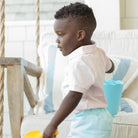 Henry Duvall boys classic polo shirt in Pink Sand, a timeless cotton polo designed for spring and summer wear.