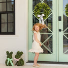 Girl wearing the Henry Duvall Charlotte Dress, a polished older girls dress designed for special occasions and coordinated family looks.