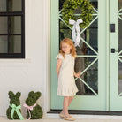 Girl wearing the Henry Duvall Charlotte Dress, a polished older girls dress designed for special occasions and coordinated family looks.