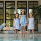 Girl wearing the Henry Duvall Schuyler Dress, a classic girls shift dress designed for summer outings and sibling matching.