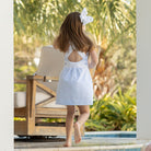 Henry Duvall girls Campell Dress in blue and white Seaside Stripe, a timeless summer dress with embroidered bow detail and open back straps