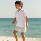 Henry Duvall boys white polo shirt with light blue embroidered logo, a classic preppy polo designed for everyday wear.