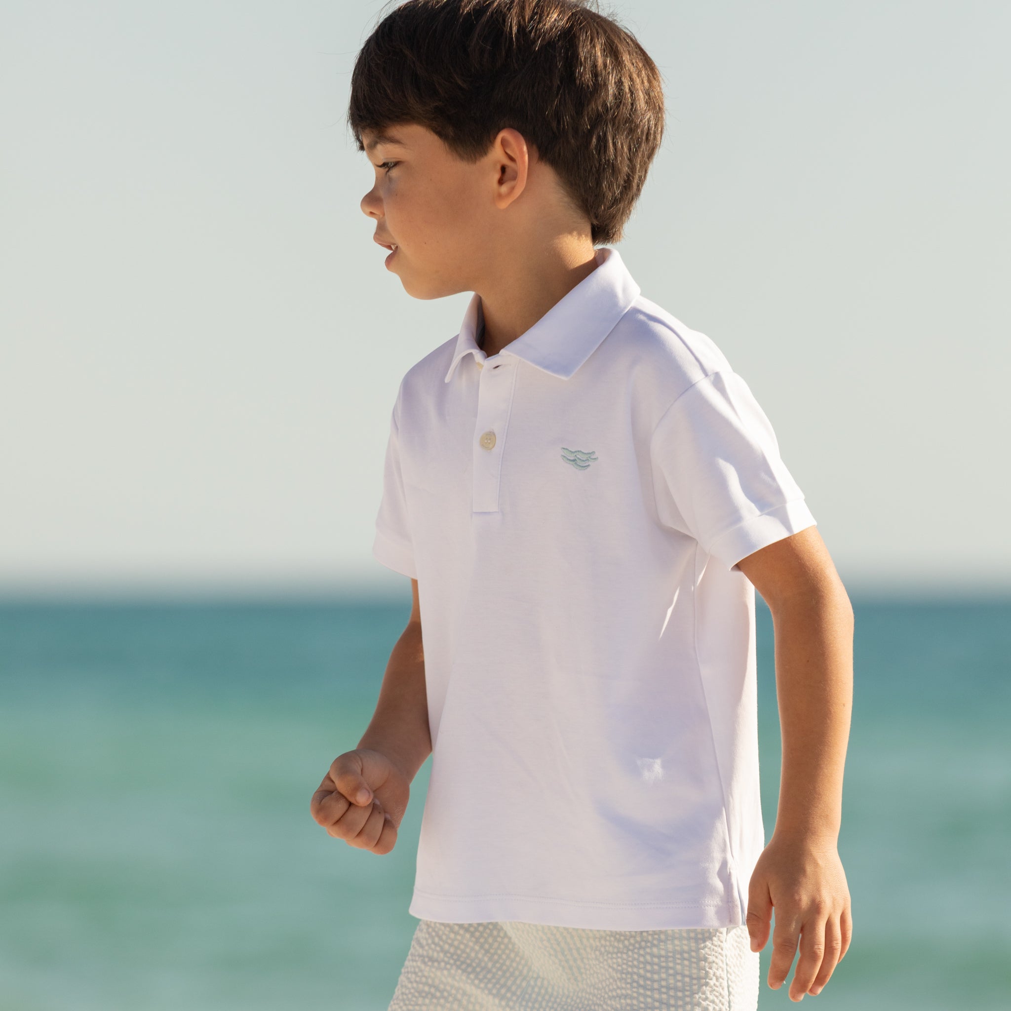 Henry Duvall boys white polo shirt with light blue embroidered logo, a classic preppy polo designed for everyday wear.