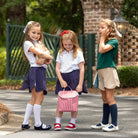 Elephantito navy patent leather Mary Jane with cut-out detail and adjustable strap, classic girls’ dress shoe for fall outfits, school events, and special occasions at Henry Duvall