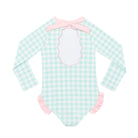Girls’ long sleeve rashguard one piece swimsuit in Seaside Seersucker with UPF 50+ and scalloped open back, perfect for summer or beach vacations by Henry Duvall.