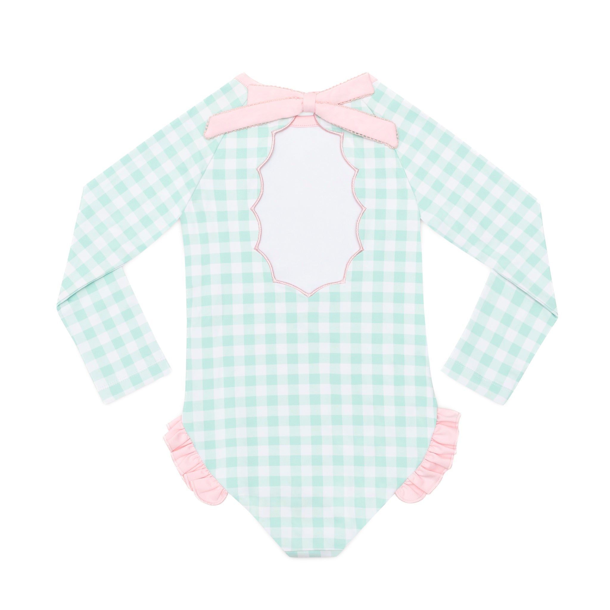 Girls’ long sleeve rashguard one piece swimsuit in Seaside Seersucker with UPF 50+ and scalloped open back, perfect for summer or beach vacations by Henry Duvall.