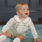 Classic baby boy bubble romper in sage green herringbone fabric, inspired by English heritage style, heirloom-quality traditional boys clothing for portraits, holidays, and special occasions