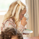 Velvet Jane Bow by Winn & William, handcrafted velvet hair bow with alligator clip, classic fall accessory for girls.