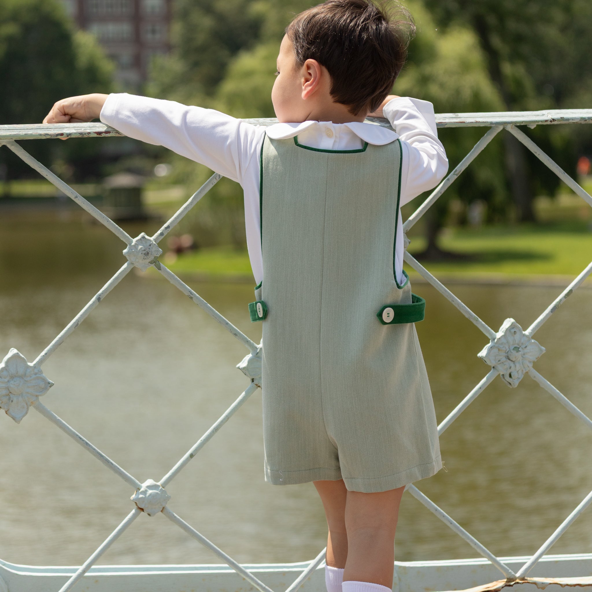 Henry Duvall classic baby boy jon jon in soft sage green herringbone, heirloom toddler outfit with shoulder buttons and stride snaps, inspired by English heritage style
