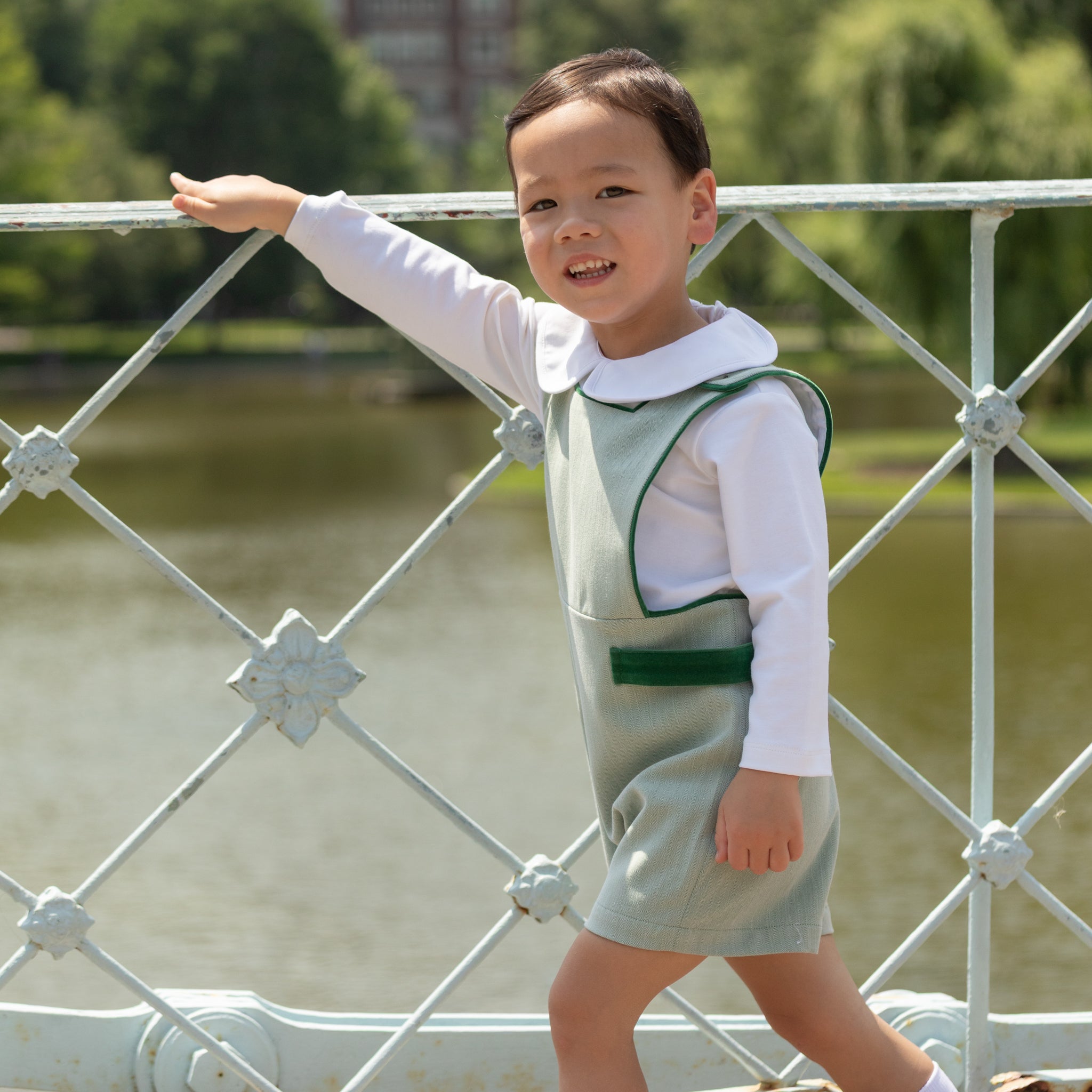 Henry Duvall classic baby boy jon jon in soft sage green herringbone, heirloom toddler outfit with shoulder buttons and stride snaps, inspired by English heritage style