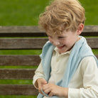Soft ivory long sleeve polo for boys by Henry Duvall, made from tagless pima cotton for all-day comfort and easy layering, a timeless fall wardrobe essential