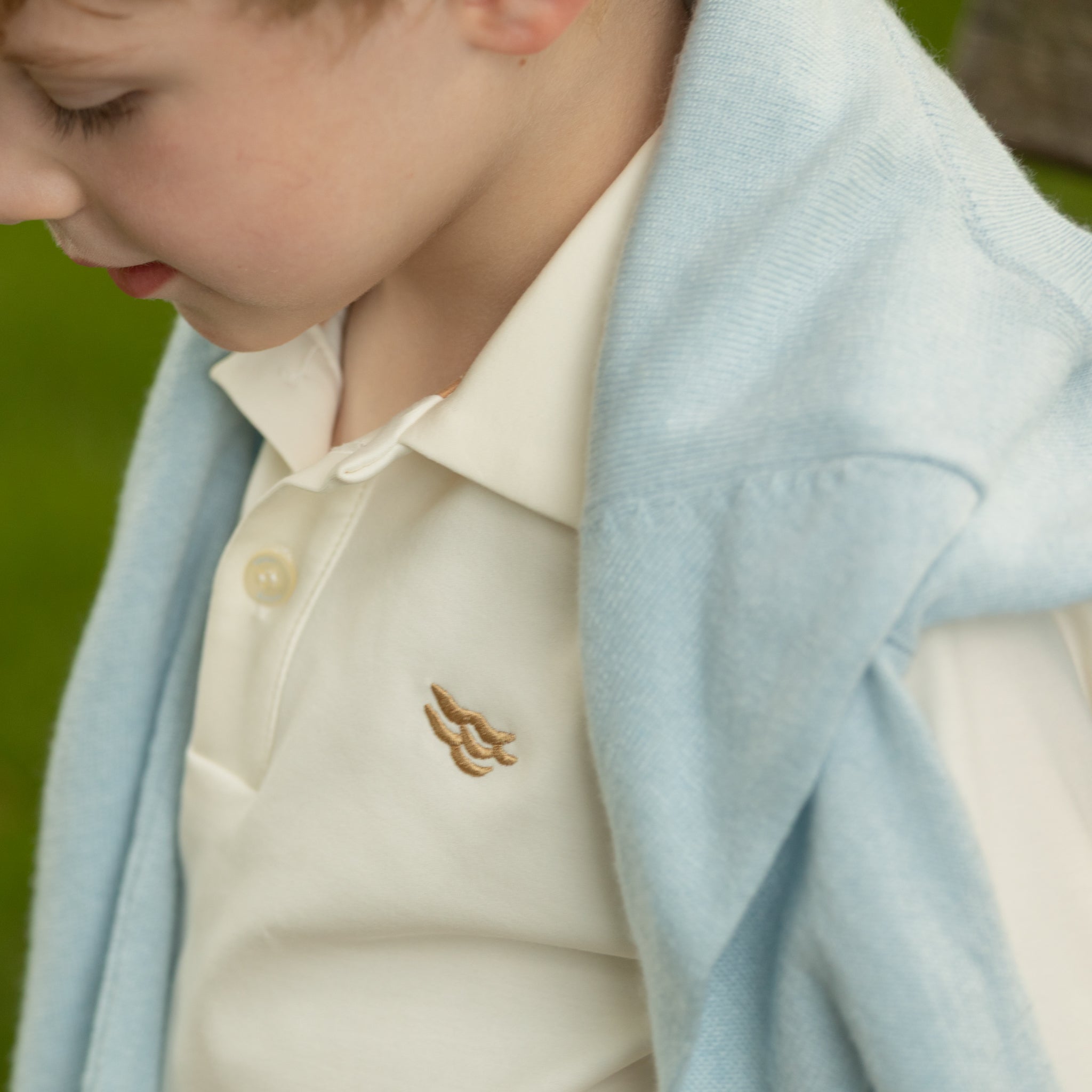 Soft ivory long sleeve polo for boys by Henry Duvall, made from tagless pima cotton for all-day comfort and easy layering, a timeless fall wardrobe essential