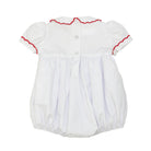 White short sleeve baby girl holiday bubble with red smocked bows, Peter Pan collar, and piped cuffs, classic Eloise Bubble by Henry Duvall for Christmas and winter celebrations