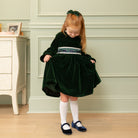 Green velvet holiday hair bow for girls with alligator clip, classic Winn & William accessory made in the USA, timeless Christmas bow to coordinate with Henry Duvall tartan and velvet holiday outfits