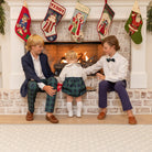 Baby boy holiday bubble in white cotton poplin and Newbury Tartan, long sleeves with snaps for easy changes, coordinates with sibling outfits for festive family photos