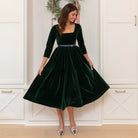 Classic women’s holiday dress in Grafton Green Velvet with tartan bow, elegant Christmas outfit to coordinate with children, Henry Duvall womenswear