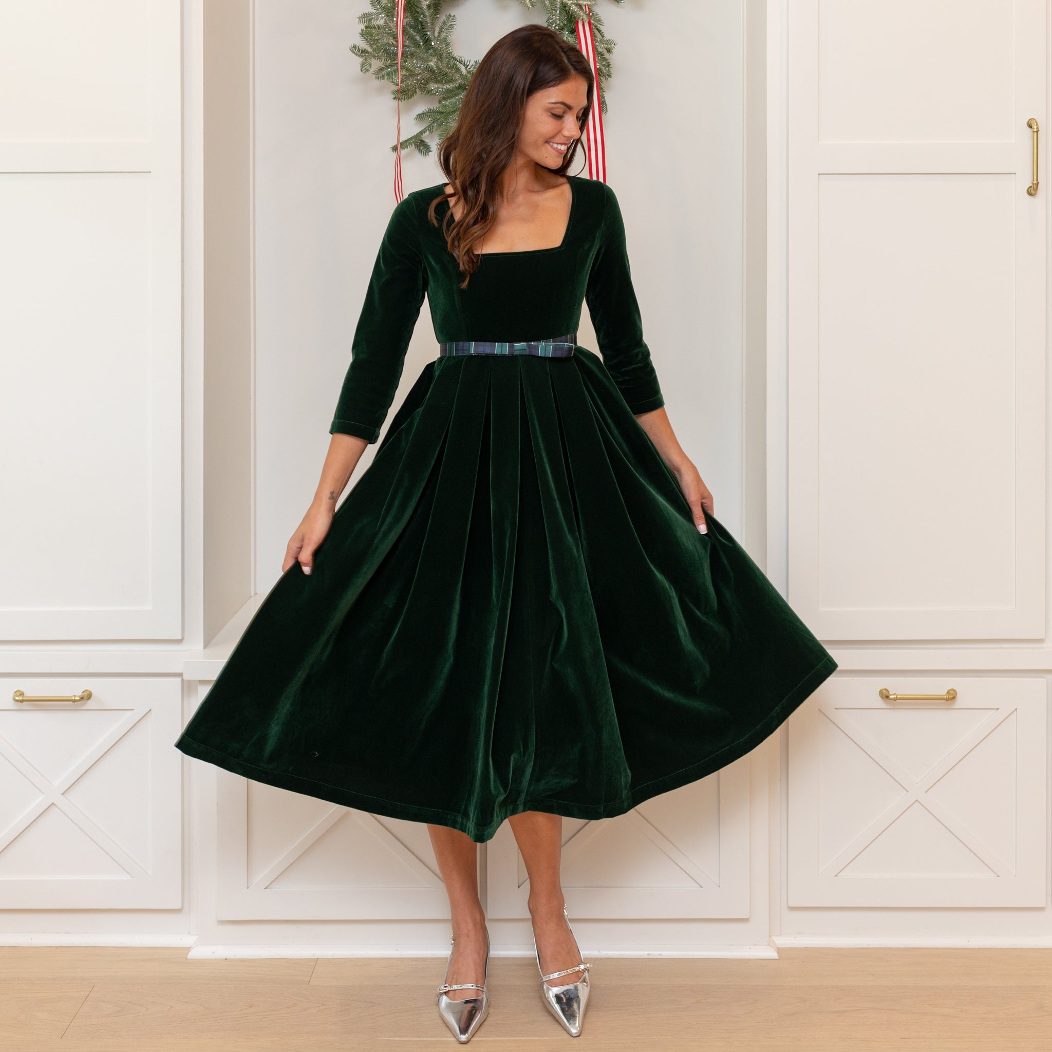 Classic women’s holiday dress in Grafton Green Velvet with tartan bow, elegant Christmas outfit to coordinate with children, Henry Duvall womenswear