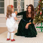 Classic women’s holiday dress in Grafton Green Velvet with tartan bow, elegant Christmas outfit to coordinate with children, Henry Duvall womenswear