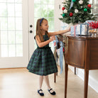 Teen girl holiday dress in Newbury Tartan with green velvet trim, classic A-line silhouette, perfect for family photos and festive gatherings