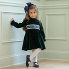 Henry Duvall Eliza Dress for girls in Grafton Green Velvet with white scalloped trim and a Newbury Tartan pre-tied sash, classic holiday dress for festive occasions