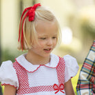 Red velvet holiday hair bow for girls with alligator clip, classic Winn & William accessory made in the USA, timeless Christmas bow to coordinate with Henry Duvall tartan and velvet holiday outfits