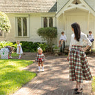 Henry Duvall Audrey Skirt for women in traditional red Townsend Tartan, classic holiday plaid skirt with flattering pleats and timeless silhouette, perfect for festive gatherings and family photos