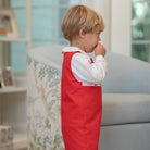 Red boys holiday Jon Jon with toy soldier smocking across the chest, Henry Duvall George Jon Jon in cotton poplin for classic Christmas dressing