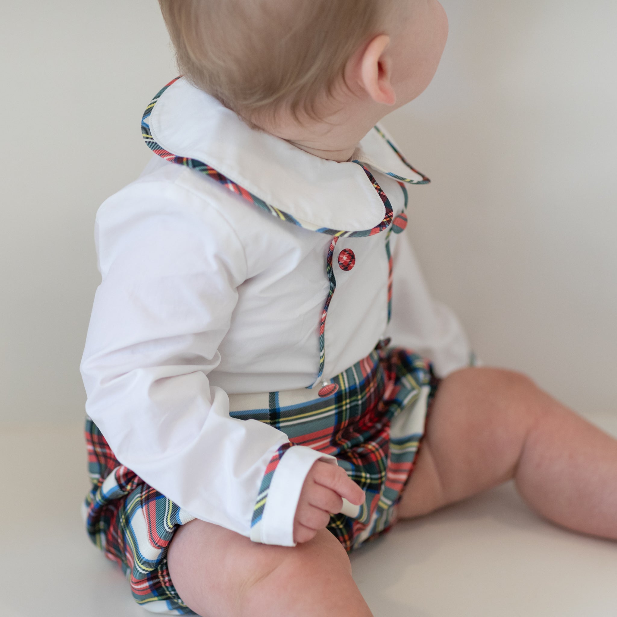 Classic baby boy bubble in traditional red Townsend Tartan with long white sleeves, boy holiday outfit with plaid for family photos