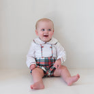 Classic baby boy bubble in traditional red Townsend Tartan with long white sleeves, boy holiday outfit with plaid for family photos