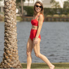 Woman’s preppy bikini, flattering two-piece swimsuit with UPF 50+ sun protection, designed to match kids’ and baby swim styles