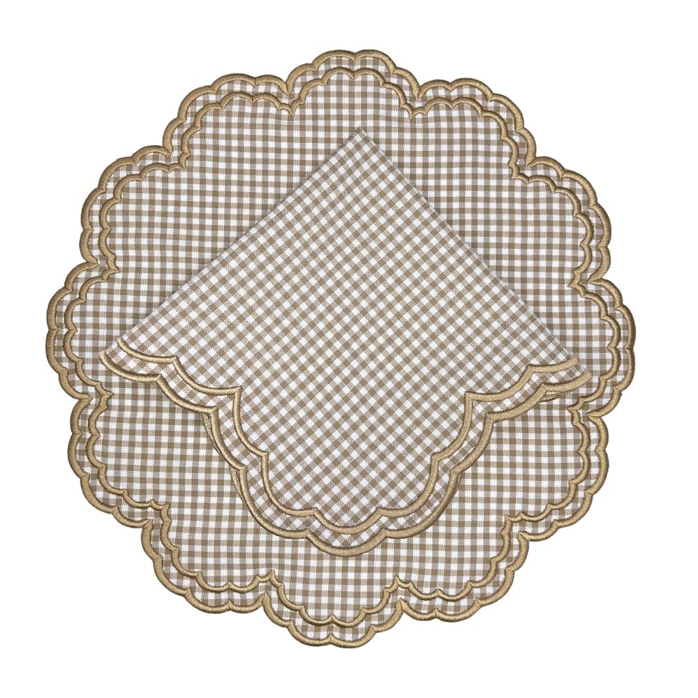 Wheat gingham placemat with scalloped edge embroidery, layered on a fall harvest table with green and gold tones