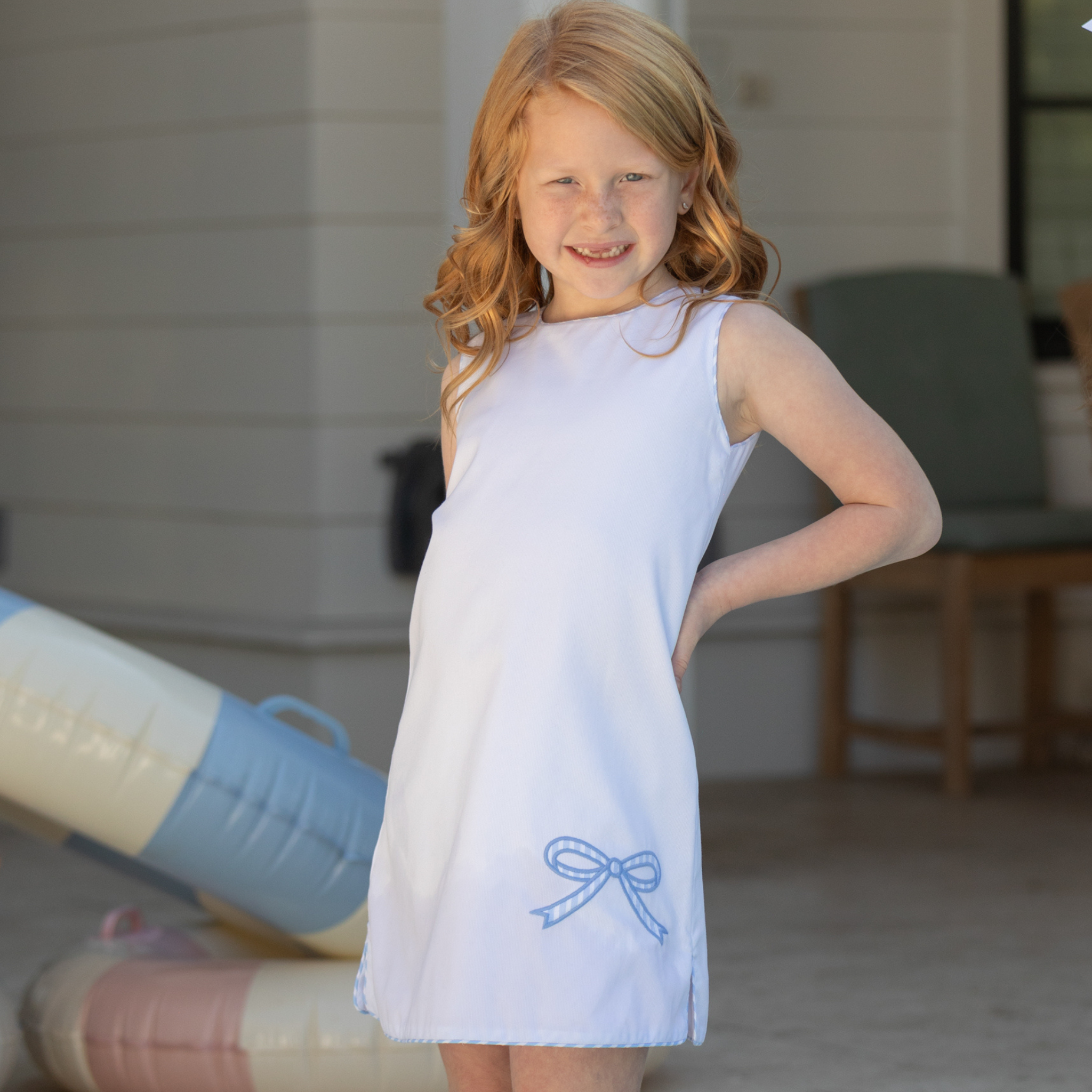 Girl wearing the Henry Duvall Schuyler Dress, a classic girls shift dress designed for summer outings and sibling matching.