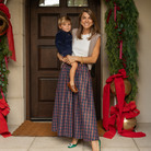 Women’s Audrey Skirt in navy, red, and green Tinsel Tartan with subtle metallic thread, featuring a full gathered midi-length silhouette.