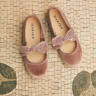 Andie Rose velvet Mary Jane in rose pink with velvet bow, pair on a mosaic floor