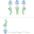 Decorative set with topiary trees, lanterns, and ribbons on a white background