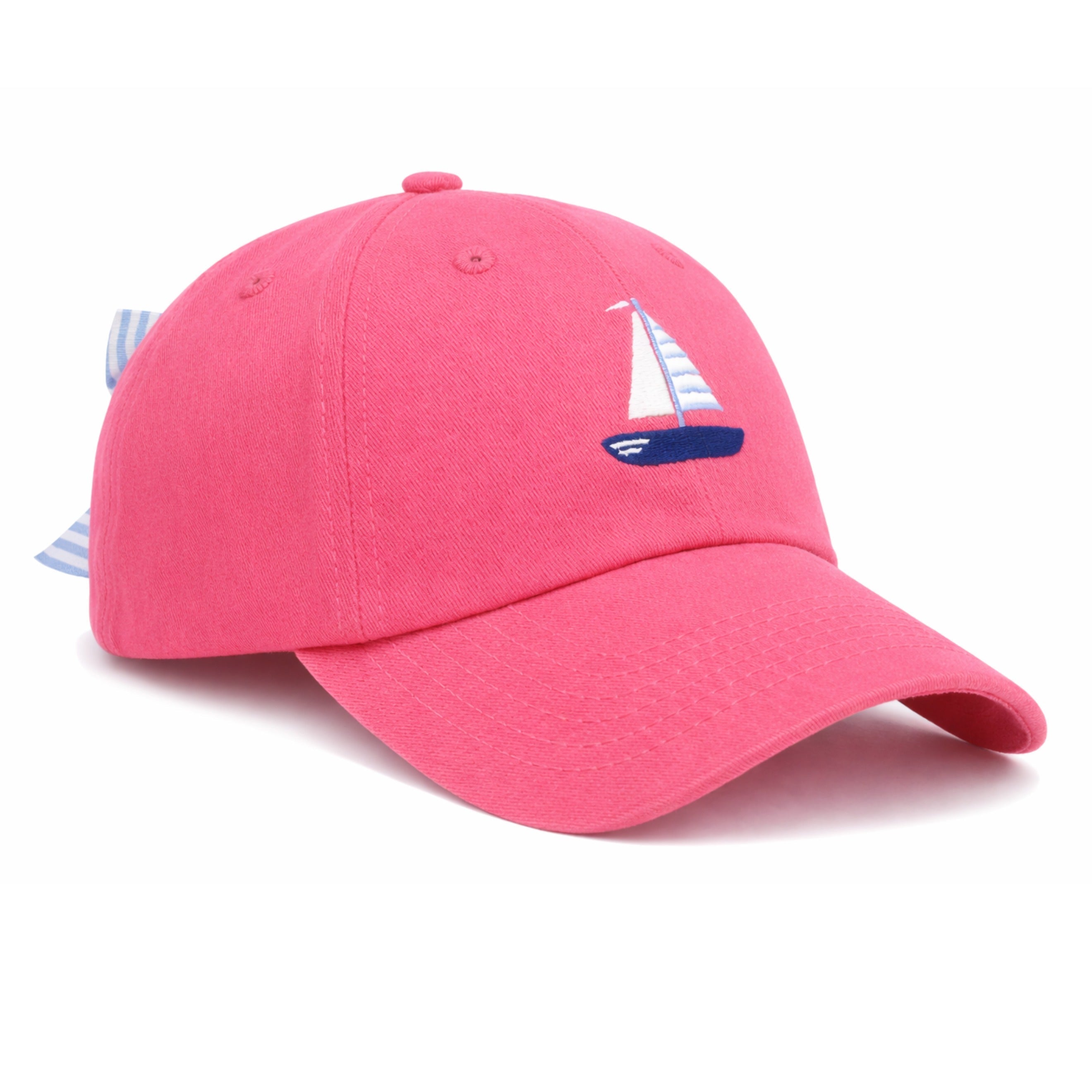 Pink cap with sailboat design on a white background