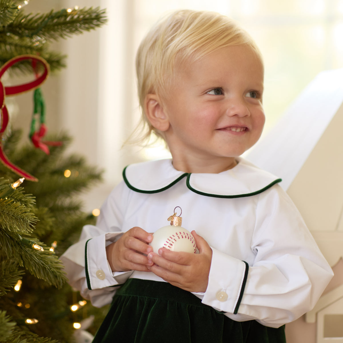 Boys’ Beau Bubble with crisp white long-sleeve cotton poplin top, green piping at the Peter Pan collar and cuffs, and gathered Grafton Green Velvet bottom.